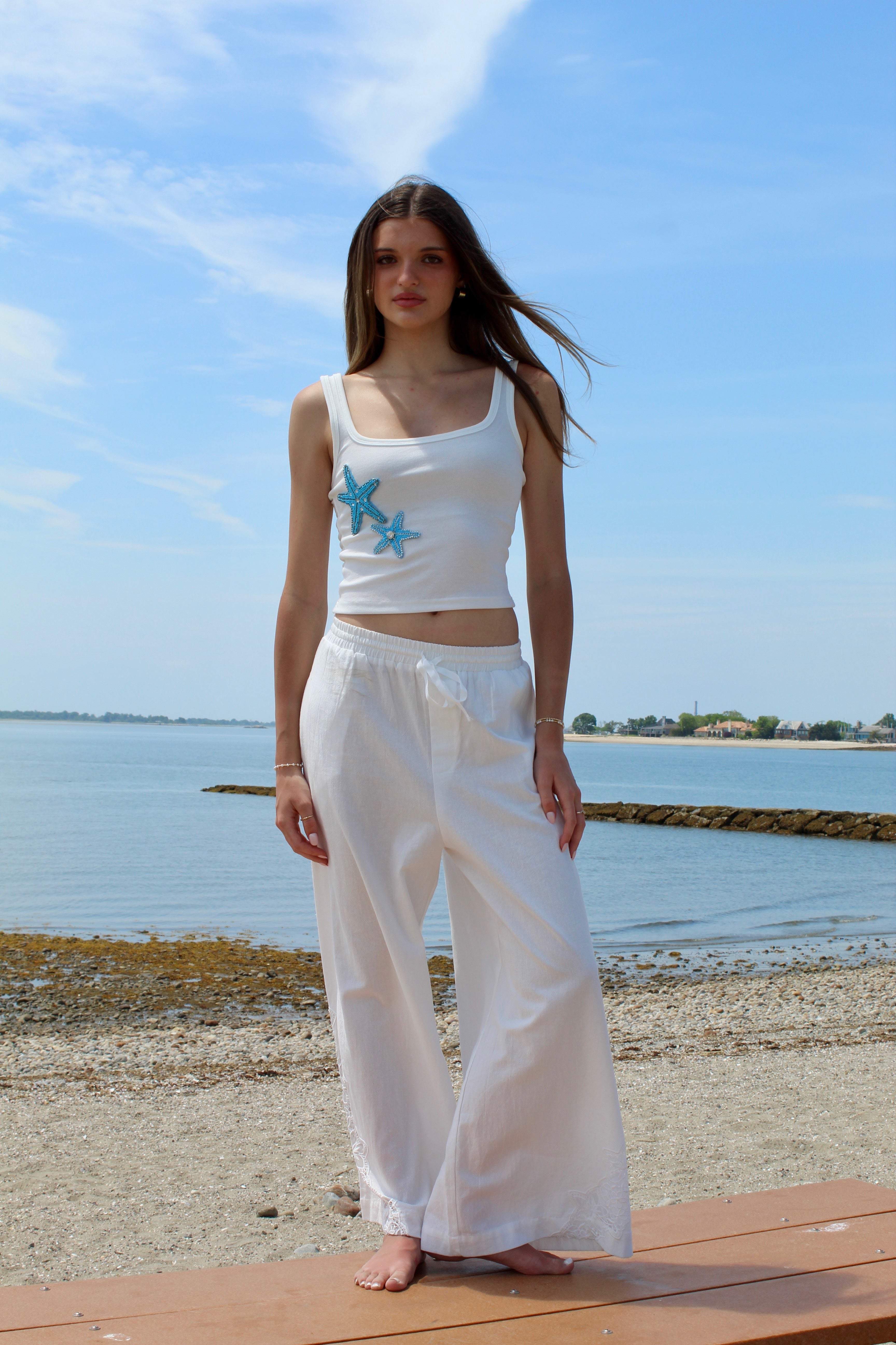 white linen pants with floral lace cut out