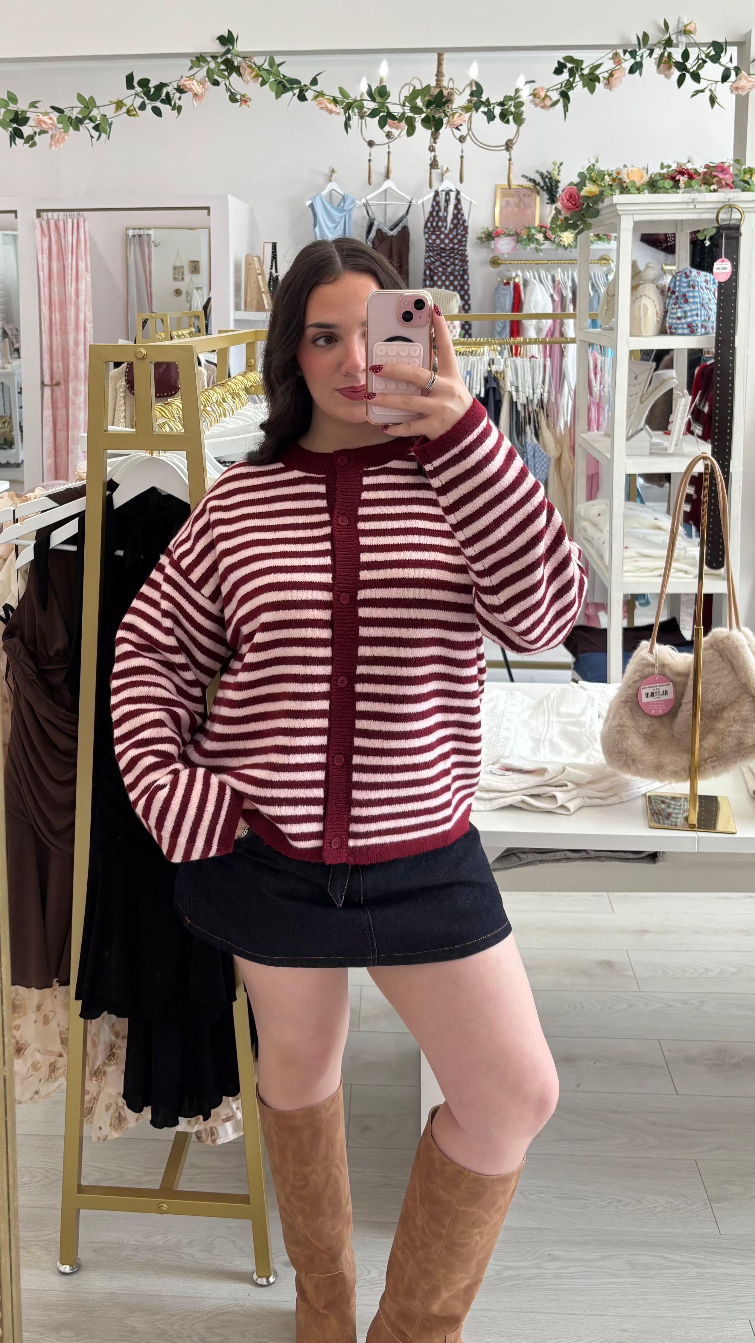 burgandy and pink striped cardigan, with mini skirt and brown boots
