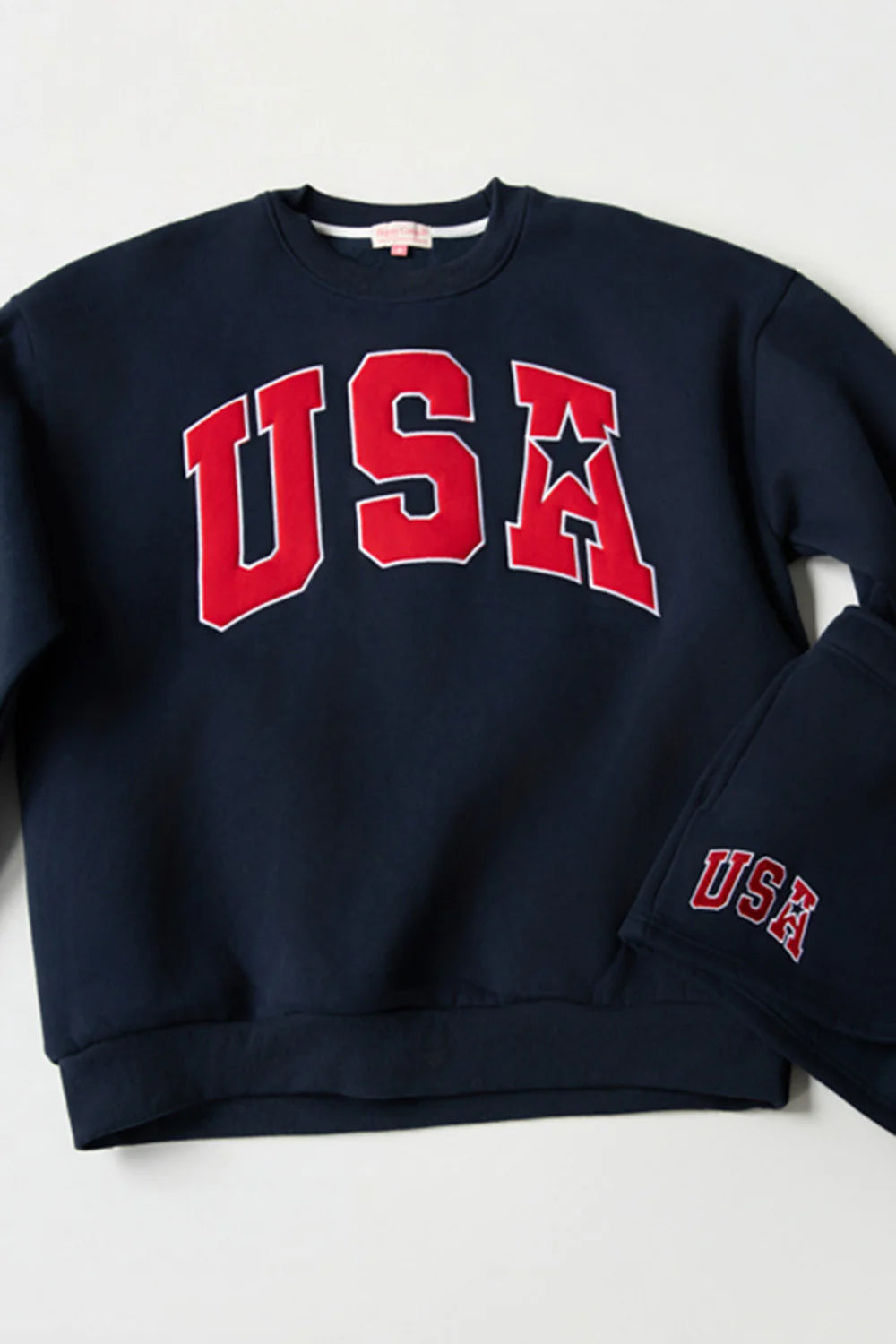 Navy USA Crewneck Sweatshirt by Happy Camp3r. Navy USA with red lettering 