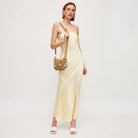 woven bag with seashell and pearl details. perfect for summer beach vacation